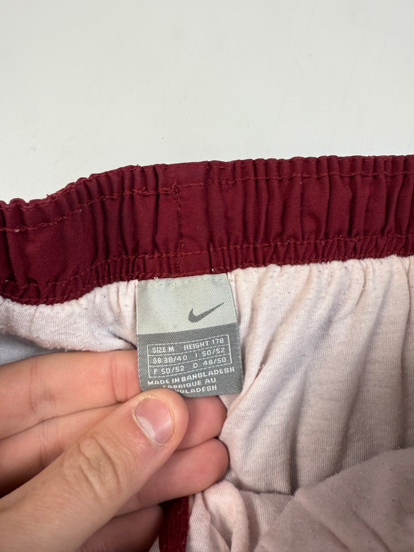 Vintage Nike mini swoosh baggy track pants (M)