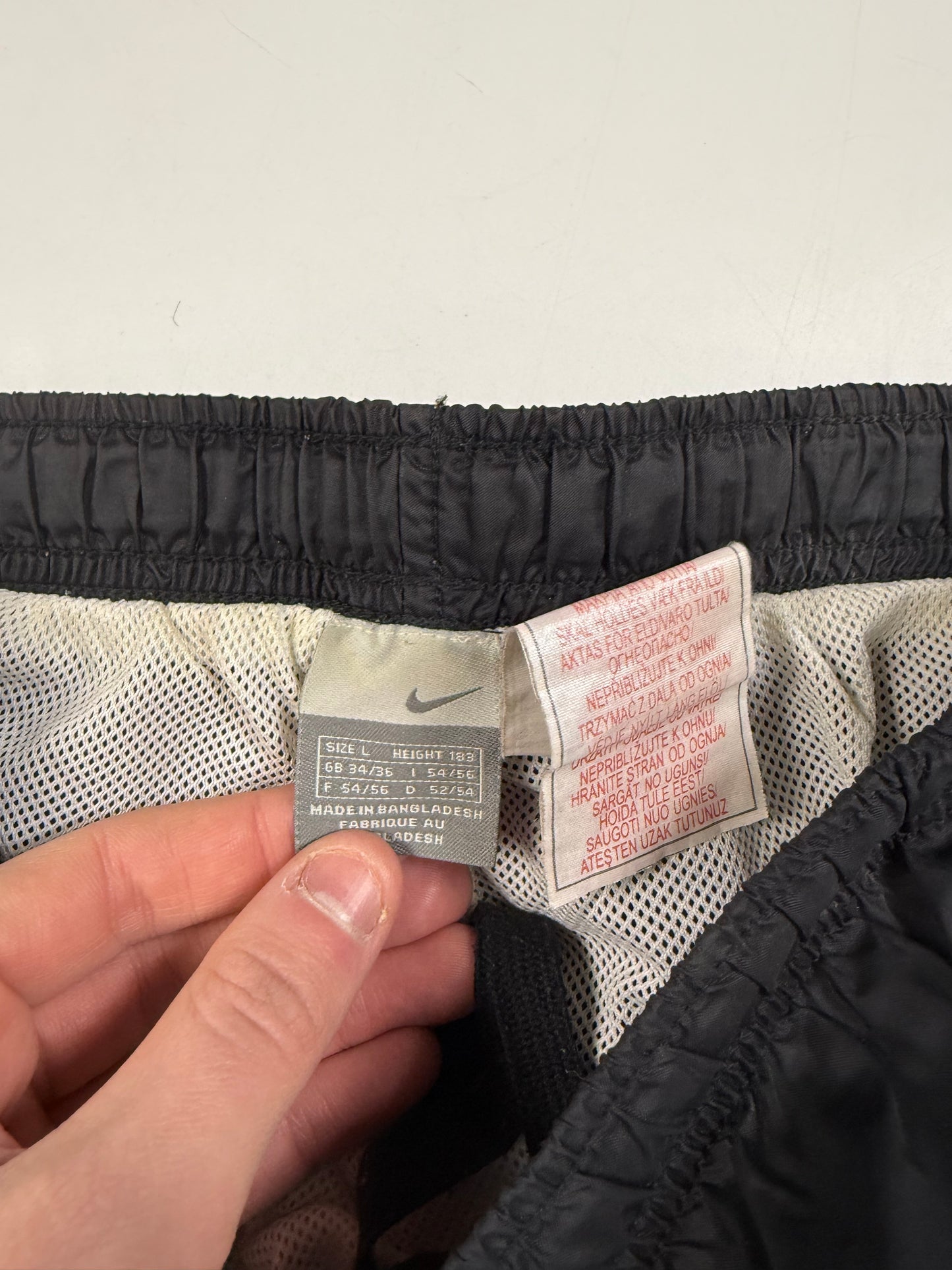 Vintage Nike side stripe baggy track pants (L)