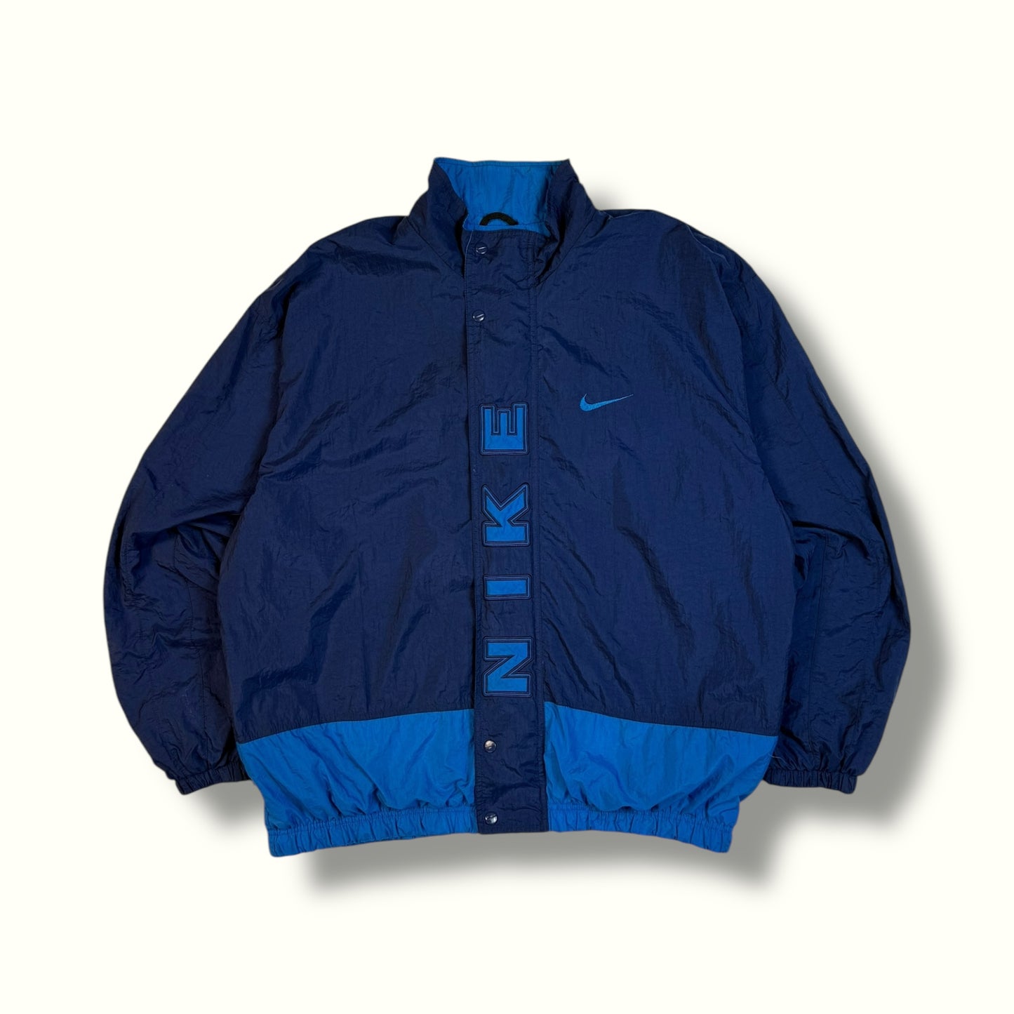 Vintage 90s Nike spell out windbreaker jacket (XL)