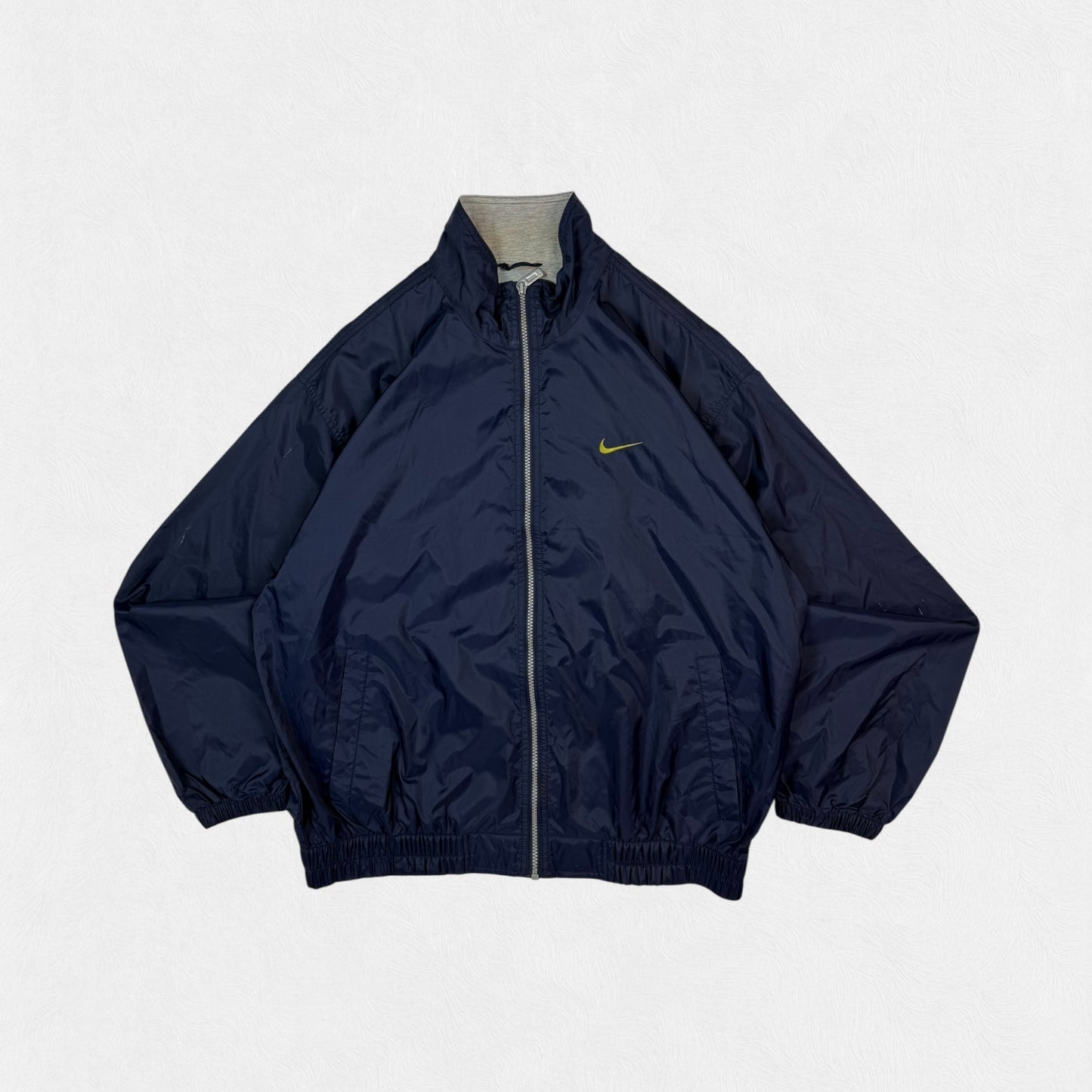 Vintage 90s Nike mini swoosh windbreaker track jacket (L)