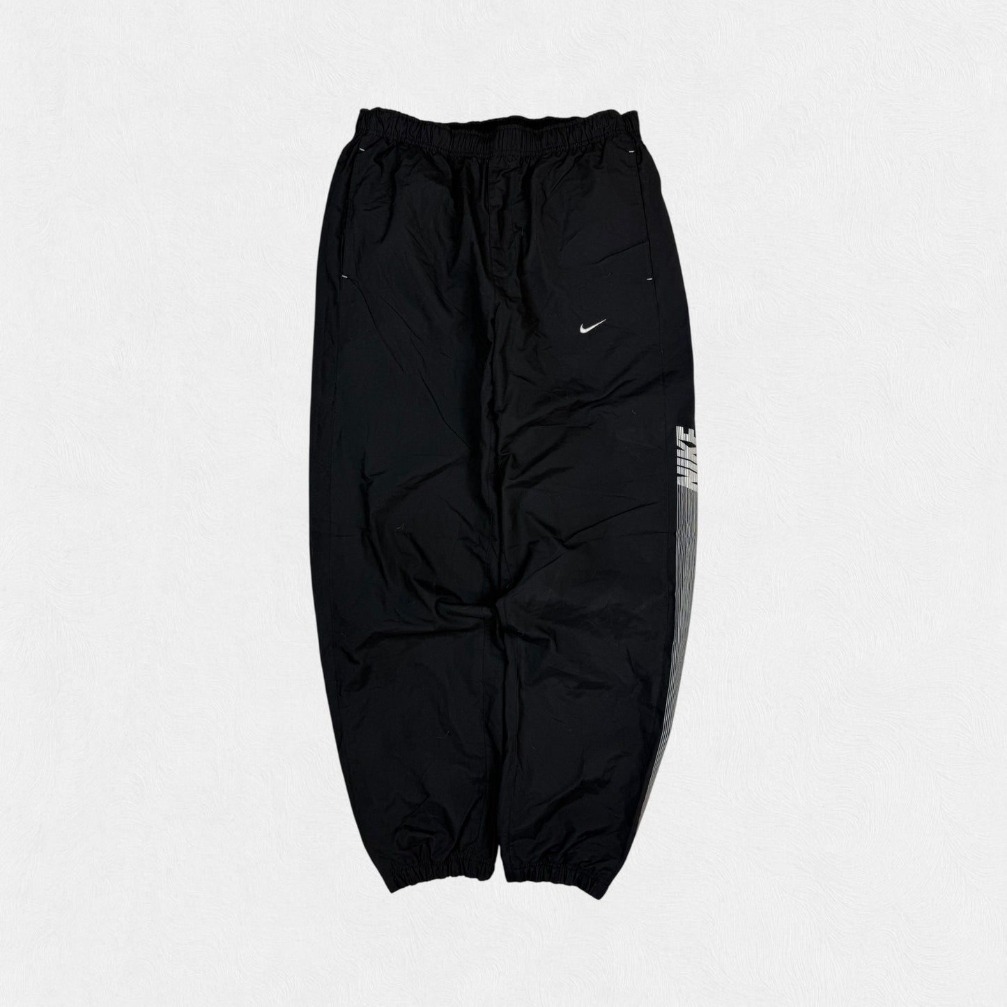 Vintage Nike spell out baggy track pants (M)