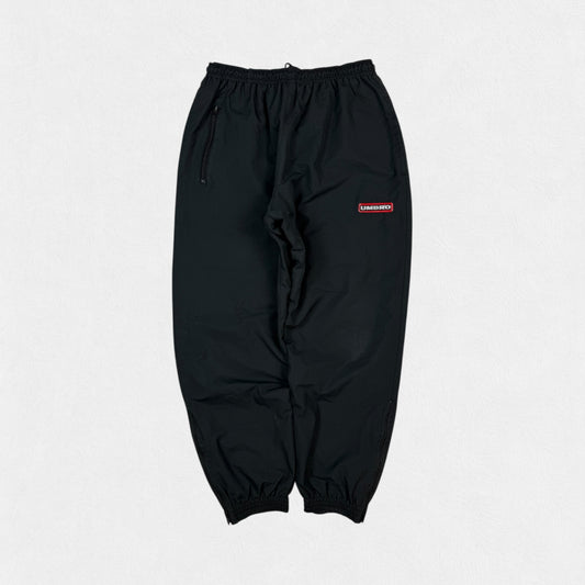 Vintage 90s Umbro baggy track pants (M)