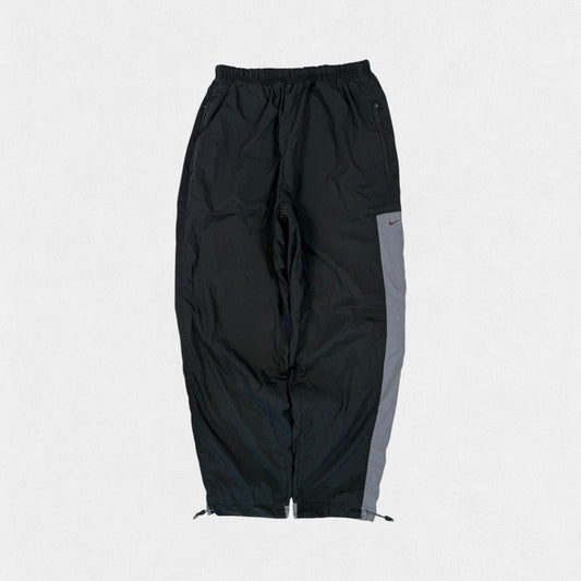 Vintage Nike side stripe baggy track pants (M)