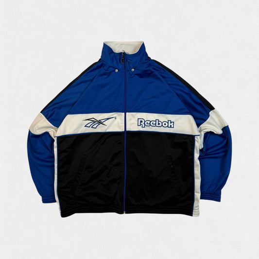 Vintage 90s Reebok spell out track jacket (L)