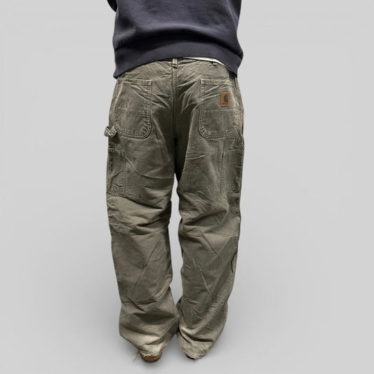 Vintage Carhartt fleece lined baggy carpenter pants (W36)