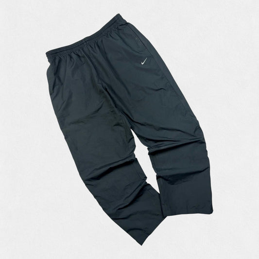 Vintage Nike mini swoosh baggy track pants (XL)