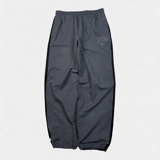 Vintage Nike side stripe baggy track pants (M)