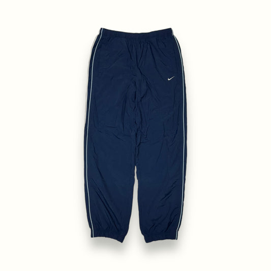 Vintage Nike navy track pants with side stripes