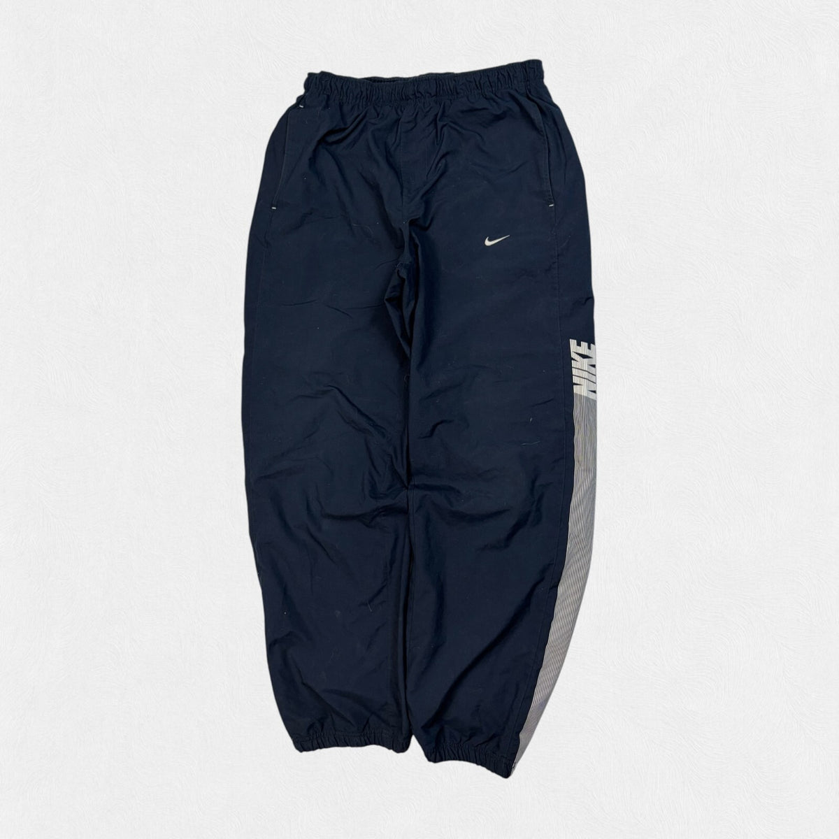 Vintage Nike spell out baggy track pants (M)