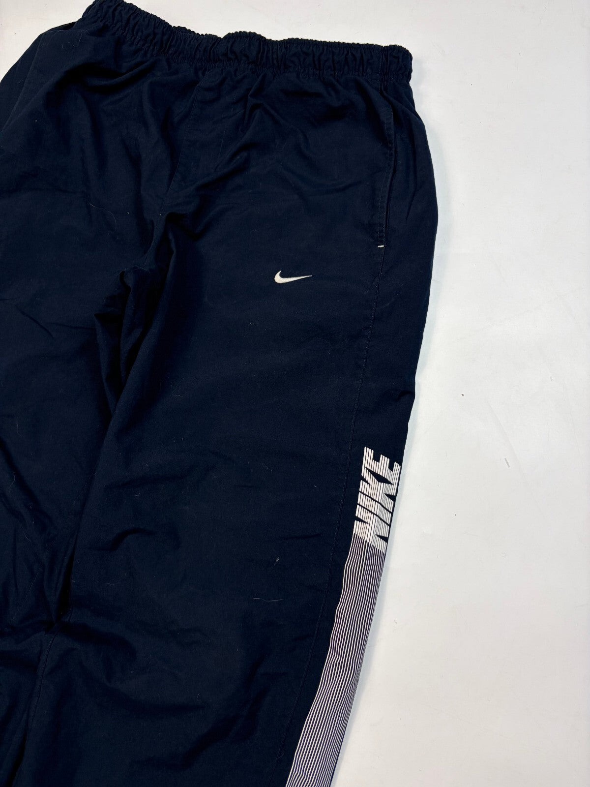 Vintage Nike spell out baggy track pants (M)