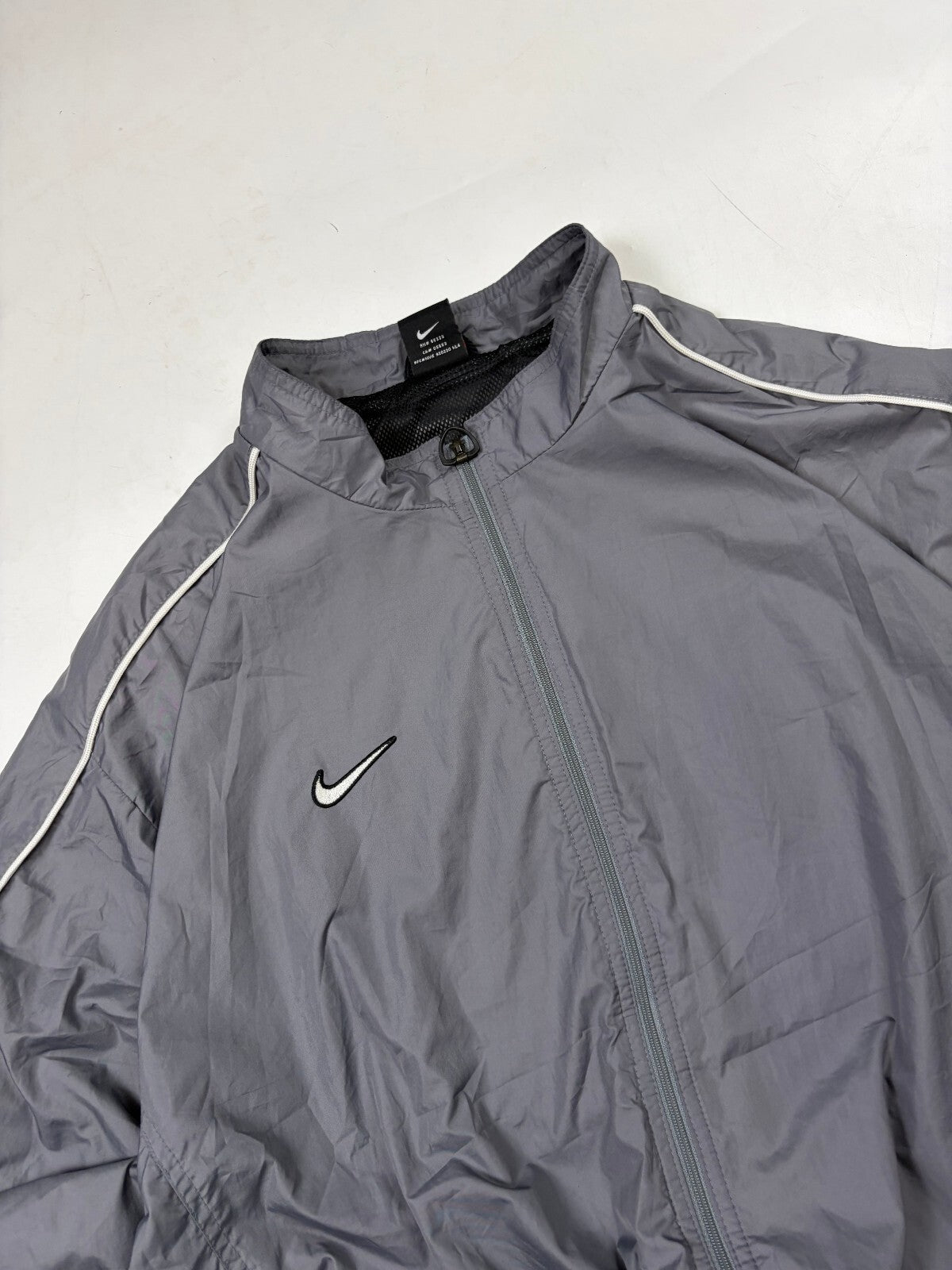 Vintage 90s Nike mini swoosh track jacket (XL)