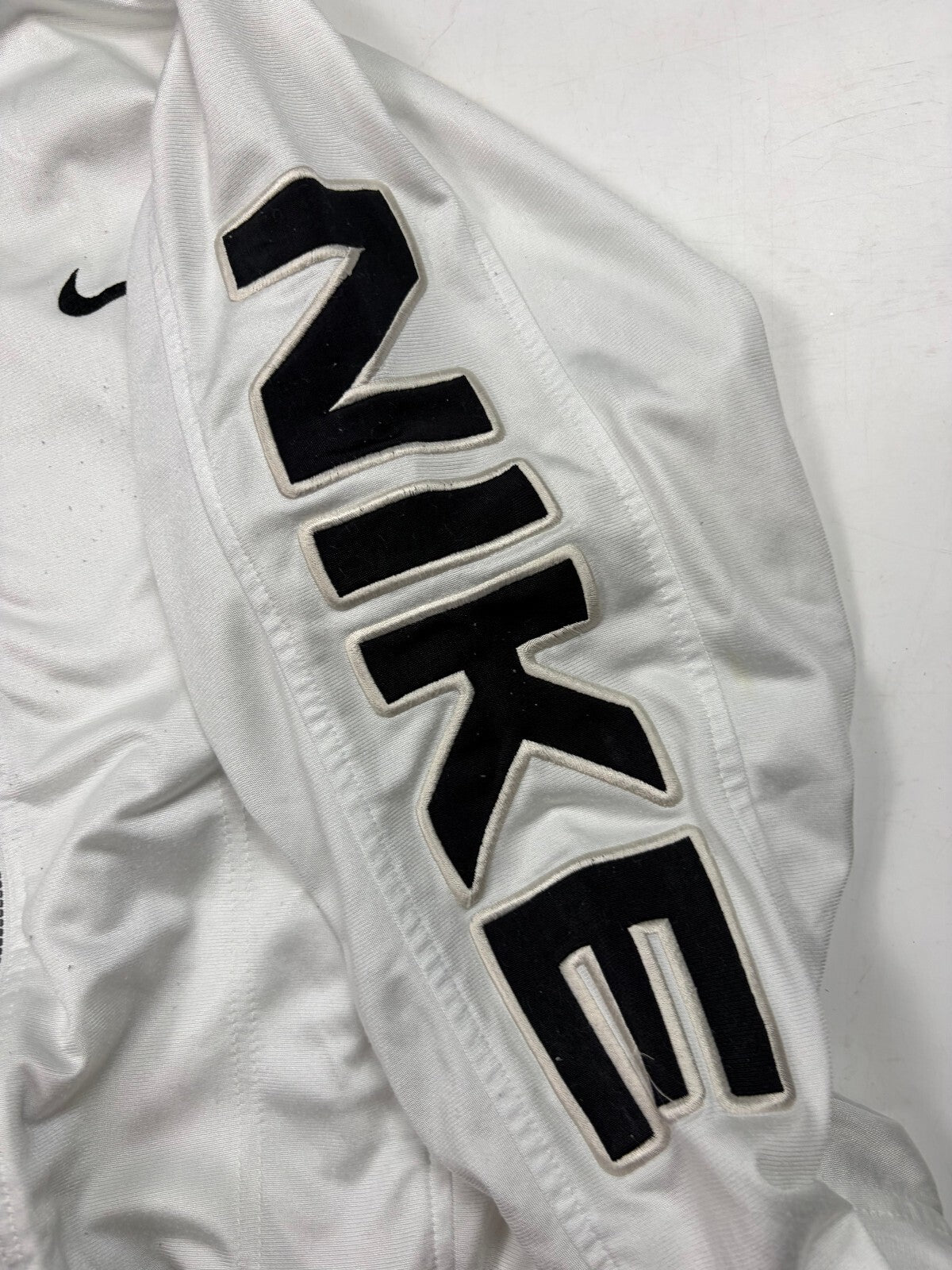 Vintage 90s Nike spell out track jacket (S)