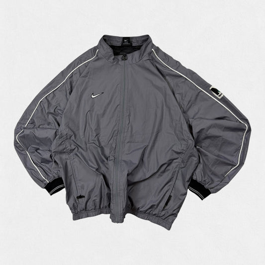 Vintage 90s Nike mini swoosh track jacket (XL)