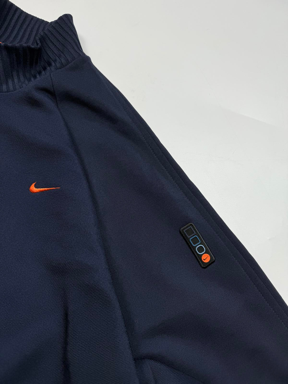 Vintage 90s Nike mini swoosh track top (XL)