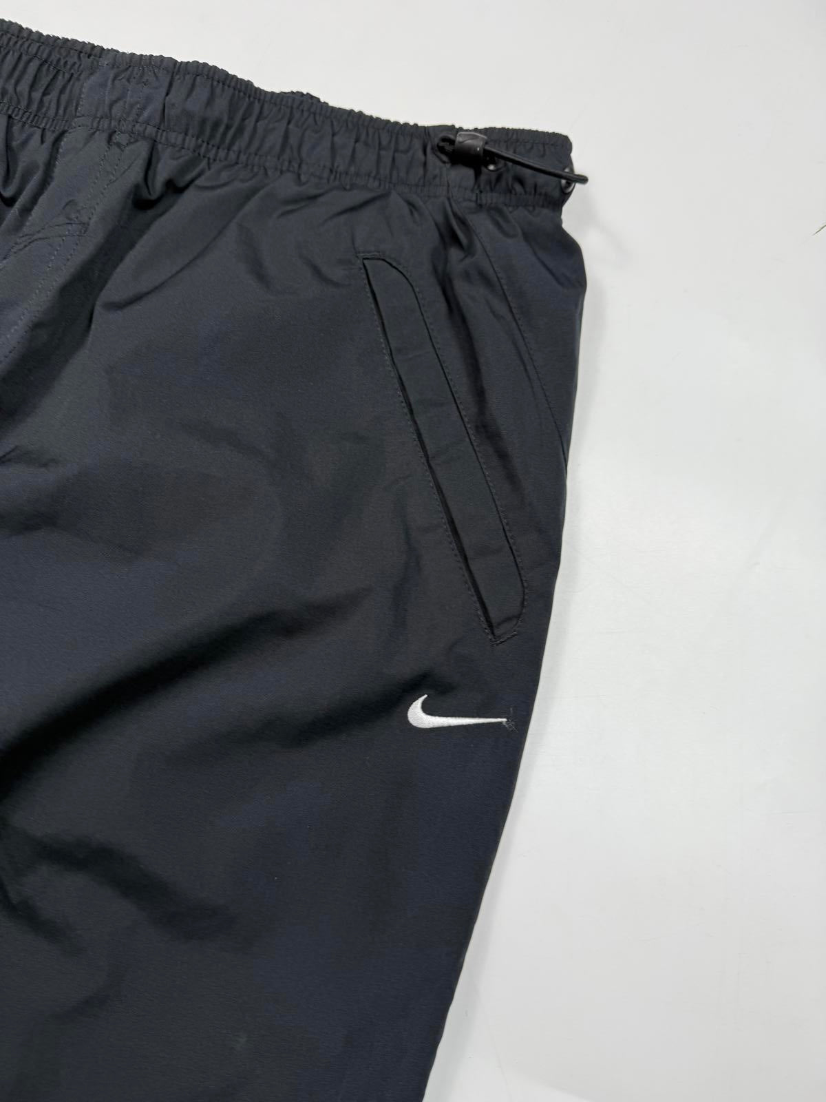 Vintage Nike mini swoosh baggy track pants (M)