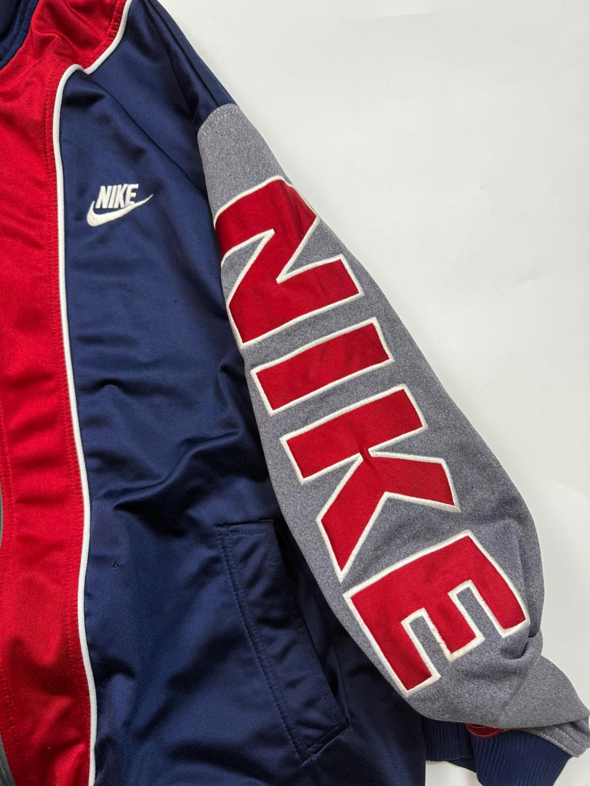 Vintage 90s Nike spell out track jacket (XL)